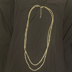 Metal bead necklace.   Purchased in the 1990s.   Heavy metal feel.